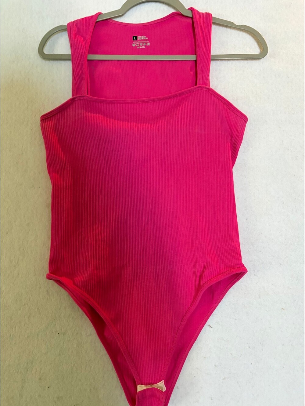 Women's Large Pink One Piece bodysuit
